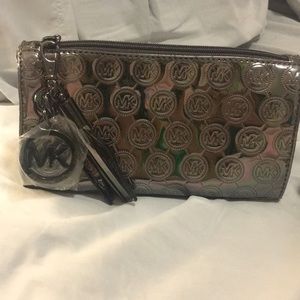 Michael Kors makeup bag.